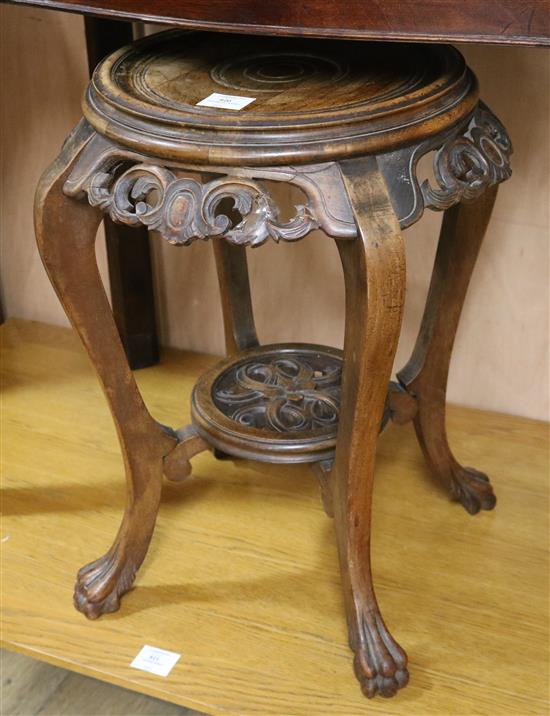 A hardwood vase stand W.43cm